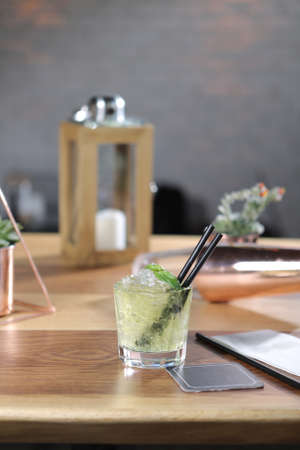 Alcohol cocktail drink on the table in restaurantの写真素材