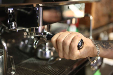 barista brewing coffee in the coffee roomの写真素材