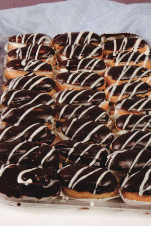 Board with delicious cake on tableの写真素材