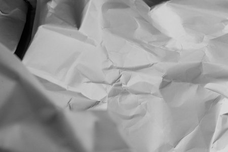 White creased crumpled paper background grunge texture backdropの写真素材