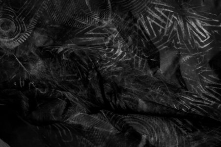 black creased crumpled paper background grunge texture backdropの写真素材