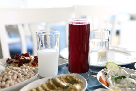 Turkish and Greek Traditional Dinning Table with Special Alcohol Drink Raki. Ouzo and Turkish Raki is a dry anise flavored aperitif that is widely consumed in Turkey, Greece, Cyprus and Lebanonの写真素材