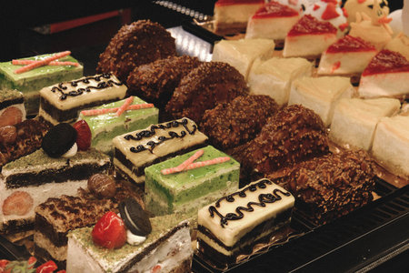 Board with delicious cake on table