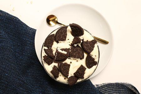 Board with delicious cake on tableの写真素材