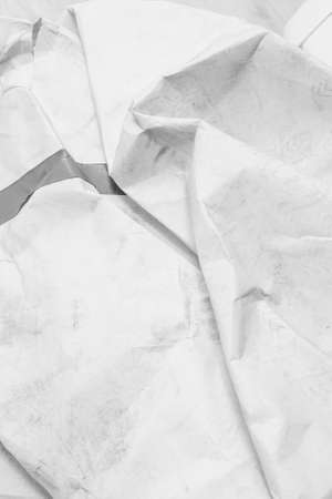 White creased crumpled paper background grunge texture backdropの写真素材