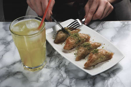 Traditional turkish dessert baklava with cashew, walnuts. Homemade baklava with nuts and honey.の写真素材