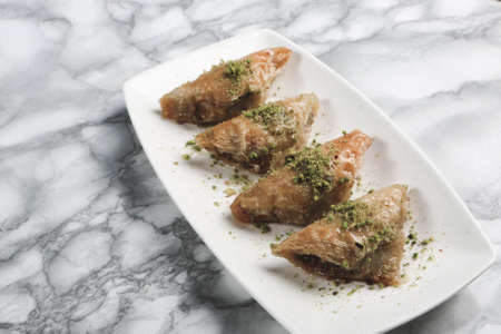 Traditional turkish dessert baklava with cashew, walnuts. Homemade baklava with nuts and honey.の写真素材