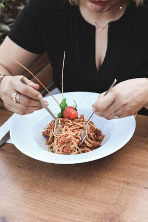 Tasty appetizing classic Italian pasta with a delicious sauce.の写真素材