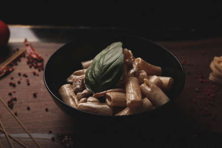 Tasty appetizing classic Italian pasta with a delicious sauce.の写真素材