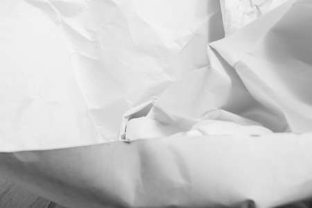White creased crumpled paper background grunge texture backdropの写真素材