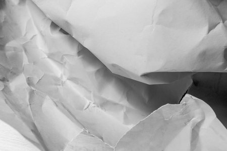 White creased crumpled paper background grunge texture backdropの写真素材