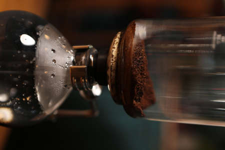 barista brewing coffee in the coffee roomの写真素材