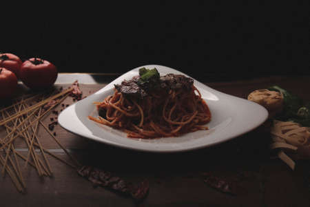 Tasty appetizing classic Italian pasta with a delicious sauce.の写真素材