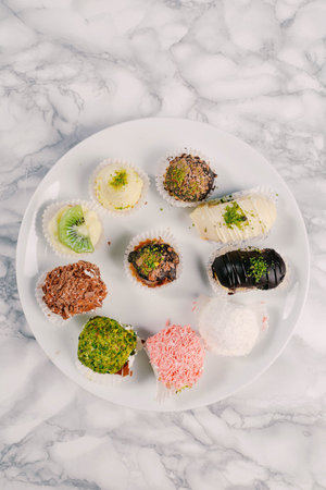 Board with delicious cake on table