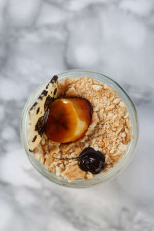 Very delicious dessert in jars, sweet and cakes in jarsの写真素材