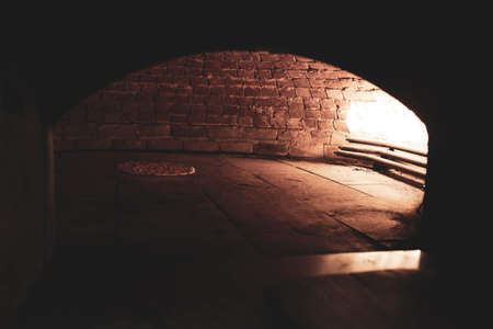 In a restaurant, pita or pita bread cooking in oven or stove. Bakery or bakehouse concept image.の写真素材