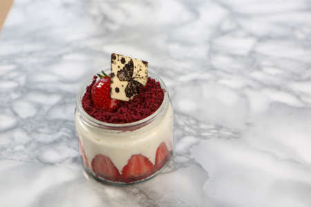 Very delicious dessert in jars, sweet and cakes in jarsの写真素材