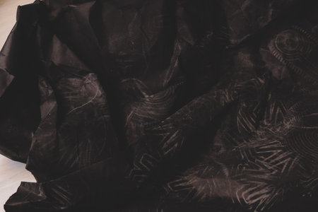 black creased crumpled paper background grunge texture backdrop