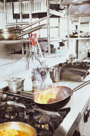 pot with cake on the fire stove cookingの写真素材