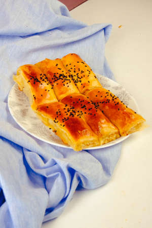 delicious layered pastry with cheese fillingの写真素材