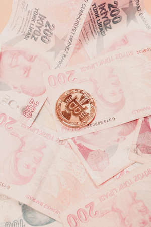 Turkish lira banknotes and bitcoin coinの写真素材