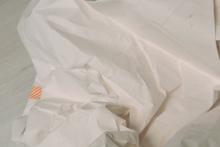 White creased crumpled paper background grunge texture backdropの写真素材