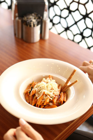 Tasty appetizing classic Italian pasta with a delicious sauce.
