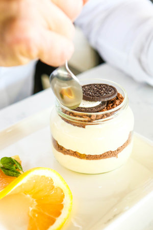 Very delicious dessert in jars, sweet and cakes in jarsの写真素材
