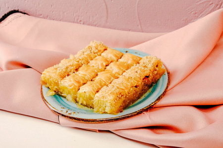 Traditional turkish dessert baklava with cashew, walnuts. Homemade baklava with nuts and honey.