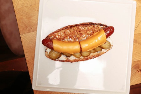 Delicious homemade hotdog on the table with french fries