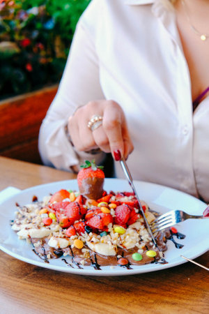 Delicious waffles with chocolate sauceの写真素材