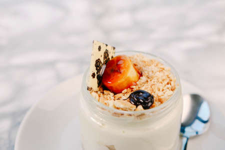 Very delicious dessert in jars, sweet and cakes in jarsの写真素材
