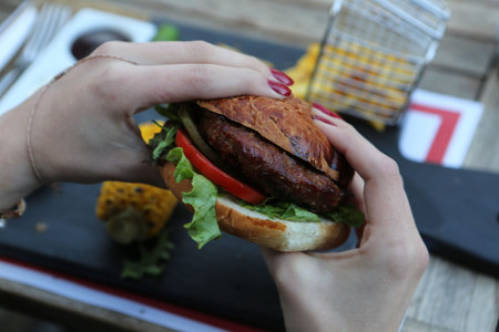Homemade hamburger with fresh vegetables