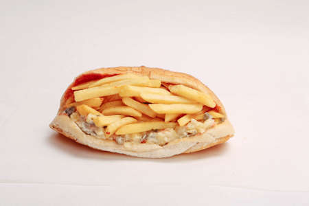 Delicious homemade hotdog on the table with french friesの写真素材