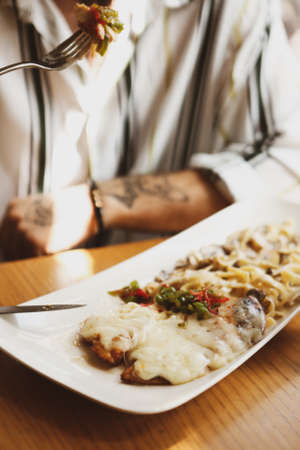 Tasty chicken meal on the tableの写真素材