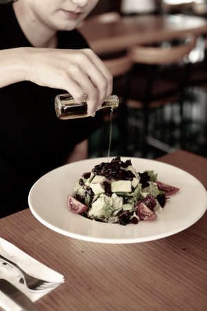 Fresh salad plate with mixed greensの写真素材
