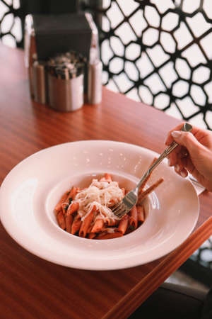 Tasty appetizing classic Italian pasta with a delicious sauce.の写真素材