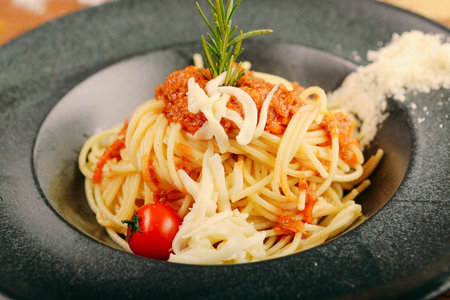 Tasty appetizing classic Italian pasta with a delicious sauce.の写真素材
