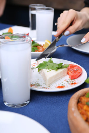 Turkish and Greek Traditional Dinning Table with Special Alcohol Drink Raki. Ouzo and Turkish Raki...