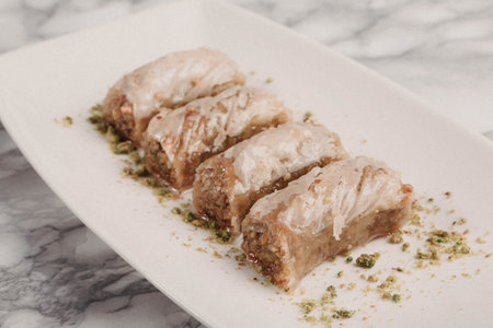 Traditional turkish dessert baklava with cashew, walnuts. Homemade baklava with nuts and honey.