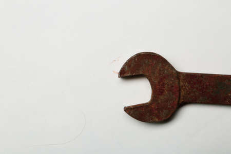 A rusty auto wrench on white backgroundの写真素材