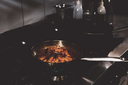 pot with cake on the fire stove cookingの写真素材