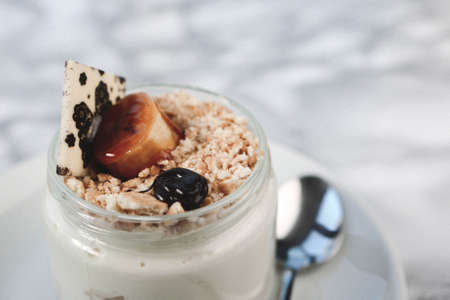 Very delicious dessert in jars, sweet and cakes in jarsの写真素材