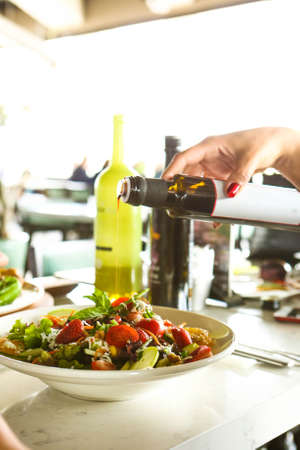 Fresh salad plate with mixed greensの写真素材
