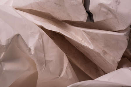 White creased crumpled paper background grunge texture backdropの写真素材