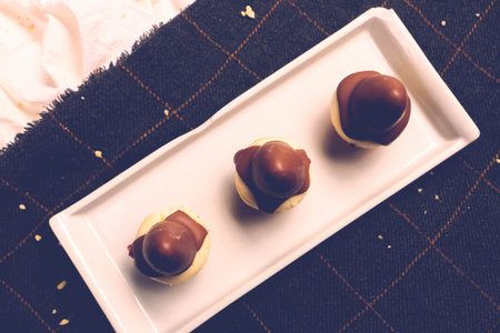 Board with delicious cake on table