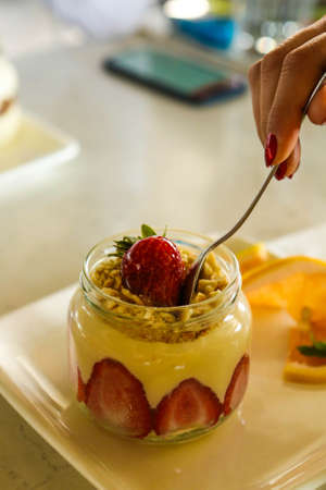 Very delicious dessert in jars, sweet and cakes in jarsの写真素材