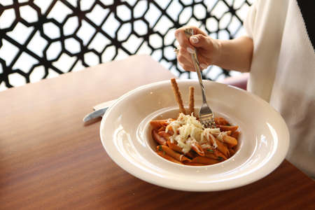 Tasty appetizing classic Italian pasta with a delicious sauce.の写真素材