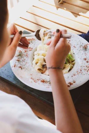 Tasty appetizing classic Italian pasta with a delicious sauce.の写真素材