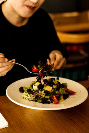 Fresh salad plate with mixed greensの写真素材